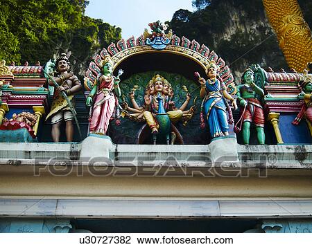 Stock Image - Entrance Sculpture to Batu Caves. Fotosearch