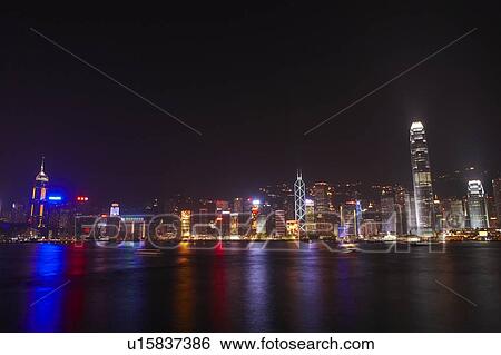 Stock Photograph - Hong Kong Victoria Harbour and city skyline. Fotosearch
