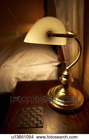 Lamp at the bedside View Large Photo Image Picture - Lamp at the bedside. Fotosearch