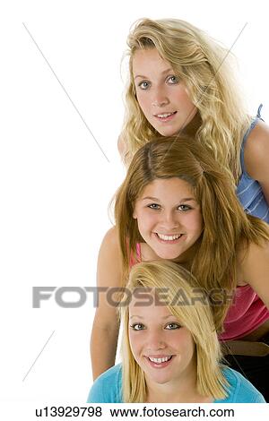 Stock Photo - Portrait Of Teenage Girls. Fotosearch