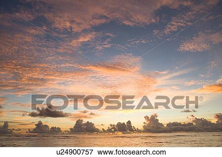 Beach in the evening glow, Saipan, USA View Large Photo Image Stock Photo - Beach in the evening glow, Saipan, USA . Fotosearch