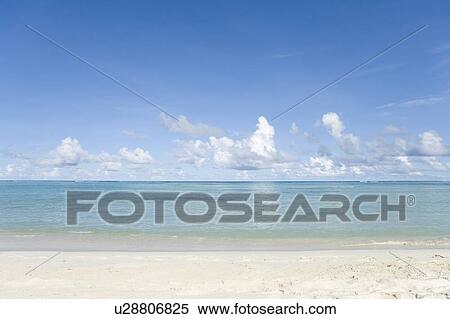 Stock Photography - Beach under the blue sky, Saipan, USA . Fotosearch