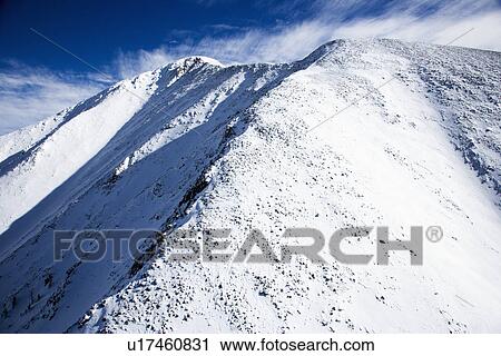 Stock Image - Aerial scenic of snowy Sangre De Cristo Mountains, Colorado, United States in winter.. Fotosearch