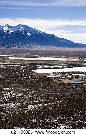 Stock Photography - Landscape of mountains and plains in rural Colorado, United States. Fotosearch