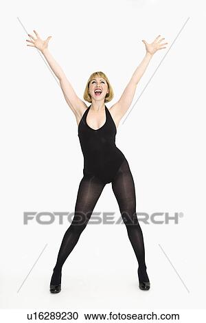 Portrait of young caucasian woman standing cheering with happiness. View Large Photo Image Stock Image - Portrait of young caucasian woman standing cheering with happiness.. Fotosearch