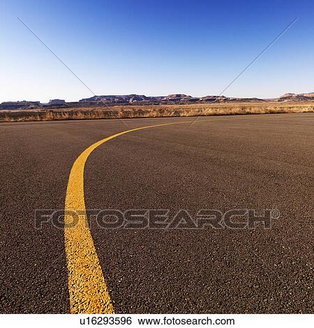Stock Photograph - Yellow line on tarmac at Canyonlands Field Airport, Utah, United States.. Fotosearch