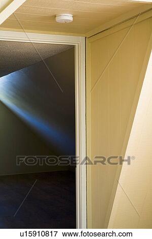 Stock Photo - Architectural detail doorway and dark empty room. Fotosearch