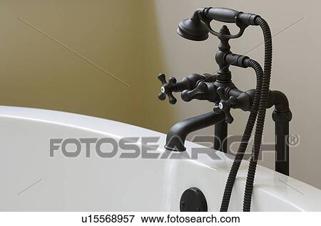 Black Bathtub Faucet With Detachable Shower Head And Running Water