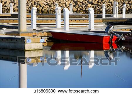 Boats docked at housing community near channel to ocean View Large Photo Image Stock Image - Boats docked at housing community near channel to ocean. Fotosearch