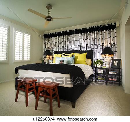 Brightly Colored Bedroom with Red Stools View Large Photo Image Picture - Brightly Colored Bedroom with Red Stools. Fotosearch