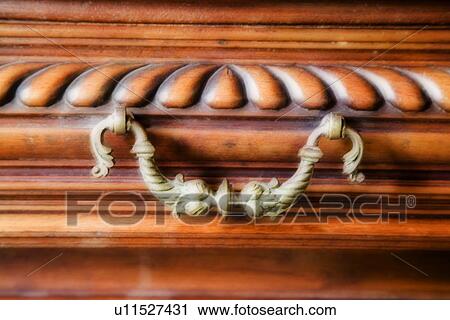 Bronze drawer handle on wooden drawer View Large Photo Image Stock Image - Bronze drawer handle on wooden drawer. Fotosearch