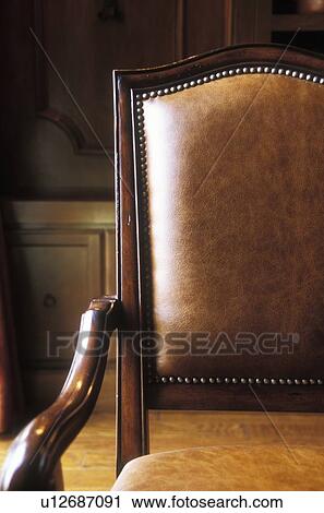 Brown leather and wood armchair View Large Photo Image Stock Image - Brown leather and wood armchair. Fotosearch