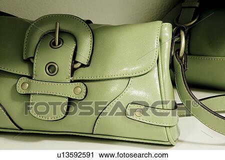 Close up green woman's purse with buckle View Large Photo Image Stock Image - Close up green woman's purse with buckle. Fotosearch