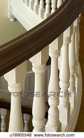 Stock Photo - Close up traditional curved banister. Fotosearch