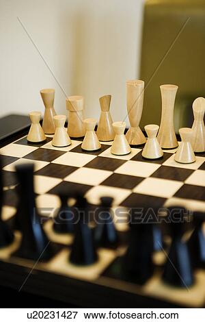 Stock Photo - Close up wooden chess set. Fotosearch