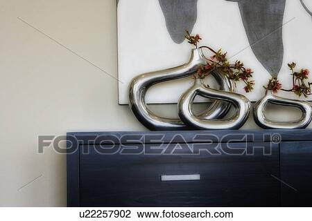 Collection of decorative vases on dresser View Large Photo Image Stock Image - Collection of decorative vases on dresser. Fotosearch
