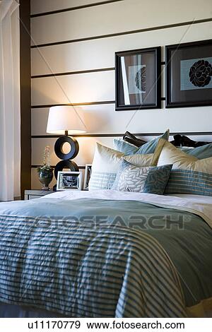Collection of pillows on bed View Large Photo Image Stock Photo - Collection of pillows on bed. Fotosearch