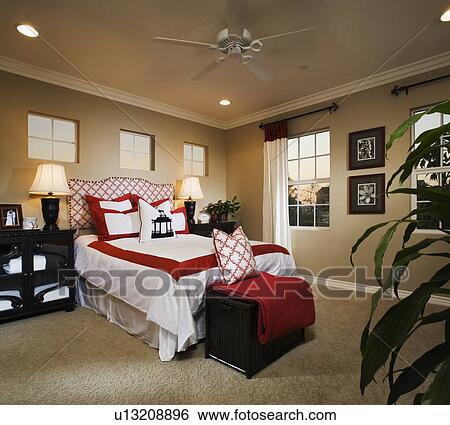 Contemporary bedroom with red and white accents View Large Photo Image Stock Photograph - Contemporary bedroom with red and white accents. Fotosearch