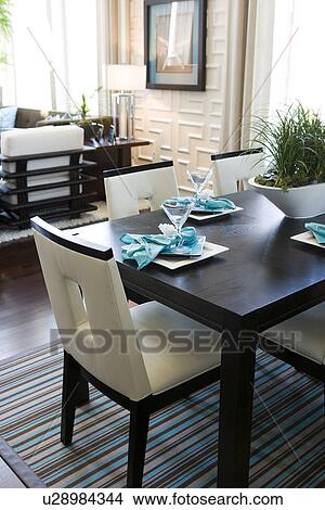 Picture - Contemporary dining area in loft style condo. Fotosearch
