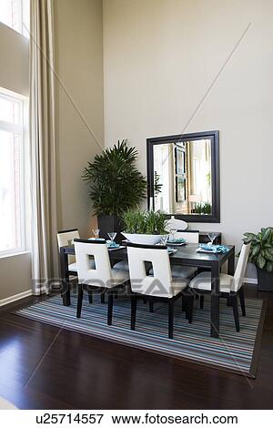 Contemporary dining area on striped area rug View Large Photo Image Stock Photo - Contemporary dining area on striped area rug. Fotosearch