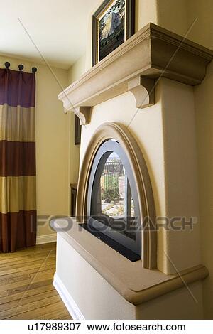Stock Photo - Contemporary fireplace with mantle. Fotosearch