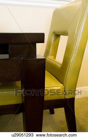 Contemporary green chair pushed under table View Large Photo Image Stock Image - Contemporary green chair pushed under table. Fotosearch