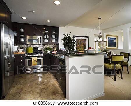 Contemporary Kitchen with Dark Wood Cabinets View Large Photo Image Stock Photo - Contemporary Kitchen with Dark Wood Cabinets. Fotosearch