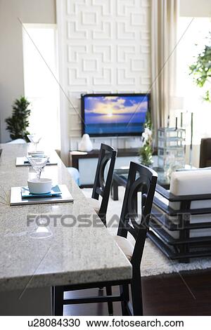 Contemporary loft interior with breakfast bar and living room View Large Photo Image Stock Image - Contemporary loft interior with breakfast bar and living room. Fotosearch