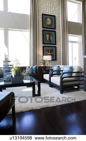 Contemporary loft style living room with area rug View Large Photo Image Stock Photo - Contemporary loft style living room with area rug. Fotosearch