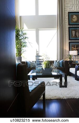 Contemporary loft style living room with area rug View Large Photo Image Stock Photography - Contemporary loft style living room with area rug. Fotosearch