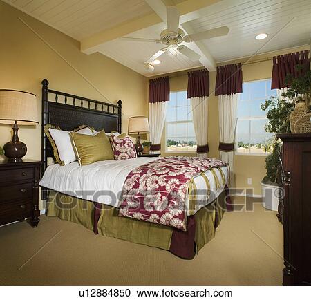 Contemporary master bedroom with wooden ceiling View Large Photo Image Stock Image - Contemporary master bedroom with wooden ceiling. Fotosearch