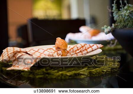 Contemporary place setting with koi napkin ring View Large Photo Image Stock Image - Contemporary place setting with koi napkin ring. Fotosearch