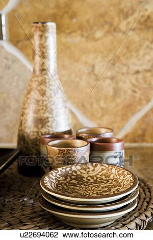 Stock Image - Contemporary saki set. Fotosearch