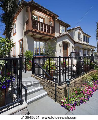 Contemporary Spanish style housing community View Large Photo Image Stock Image - Contemporary Spanish style housing community. Fotosearch
