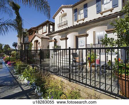 Contemporary Spanish style housing community View Large Photo Image Stock Photography - Contemporary Spanish style housing community. Fotosearch