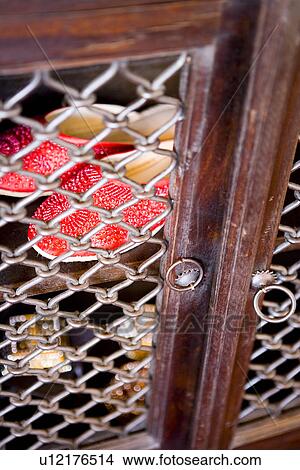Detail cabinet with metal link doors View Large Photo Image Picture - Detail cabinet with metal link doors. Fotosearch