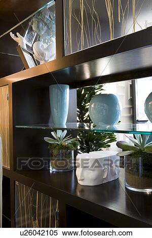 Stock Photography - Detail contemporary display shelf with decorations. Fotosearch