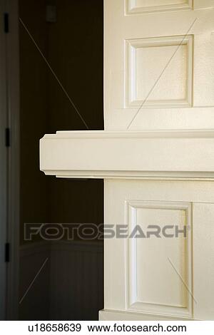 Stock Photo - Detail corner of interior wall with wainscoting. Fotosearch