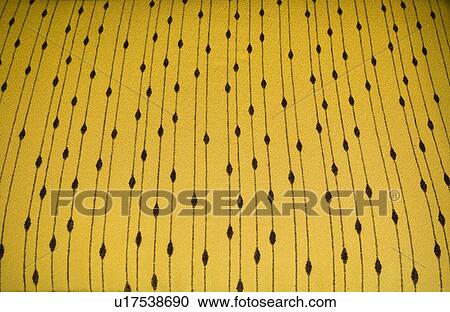 Stock Image - Detail cushion with retro designed embroidery. Fotosearch