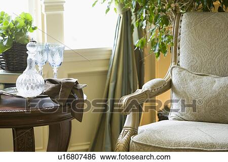 Detail elegant armchair and end table View Large Photo Image Stock Photograph - Detail elegant armchair and end table. Fotosearch