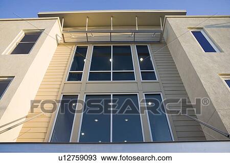 Detail front exterior contemporary loft style condo View Large Photo Image Stock Image - Detail front exterior contemporary loft style condo. Fotosearch