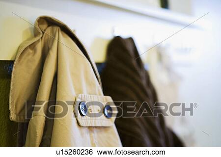 Detail jackets hanging on wall View Large Photo Image Stock Photograph - Detail jackets hanging on wall. Fotosearch