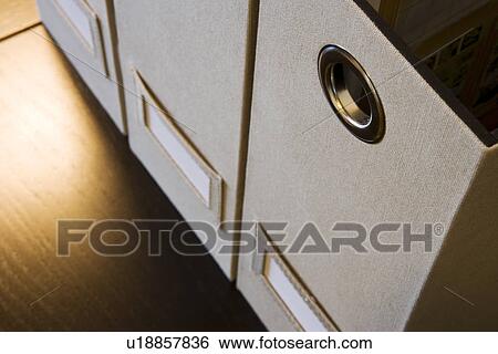 Stock Photograph - Detail magazine storage boxes. Fotosearch