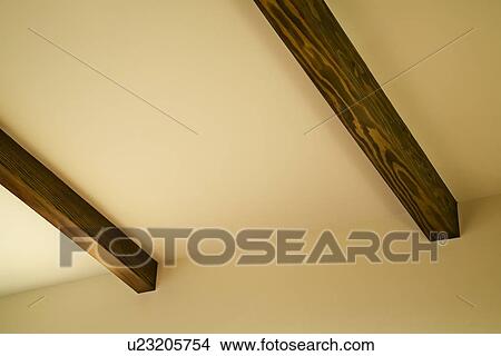 Detail of ceiling beams in home View Large Photo Image Picture - Detail of ceiling beams in home. Fotosearch