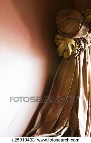 Stock Image - Detail of elegant drapes. Fotosearch