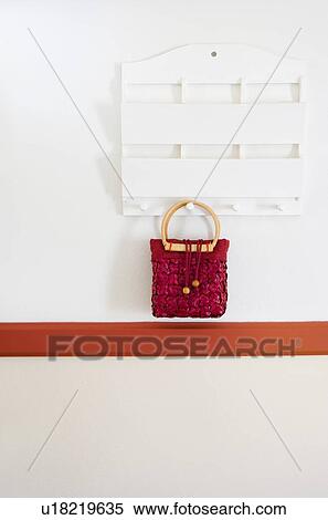 Detail organizer on wall with purse View Large Photo Image Stock Photography - Detail organizer on wall with purse. Fotosearch