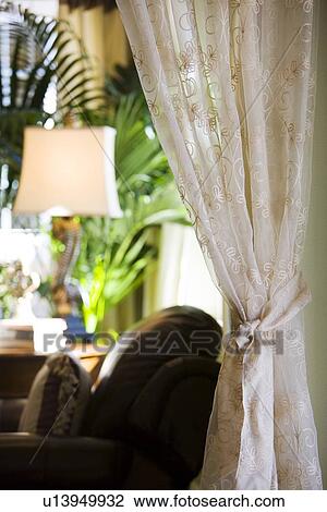 Stock Image - Detail sheer drapes with embroidery. Fotosearch