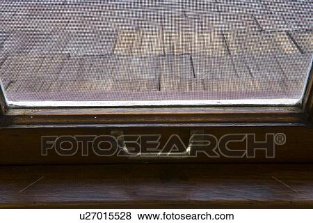 Stock Photo - Detail single hung window with handle. Fotosearch