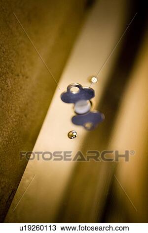 Detail small key in lock View Large Photo Image Stock Image - Detail small key in lock. Fotosearch