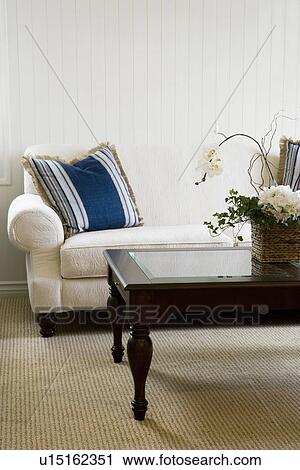 Detail white sofa and wooden coffee table View Large Photo Image Stock Image - Detail white sofa and wooden coffee table. Fotosearch